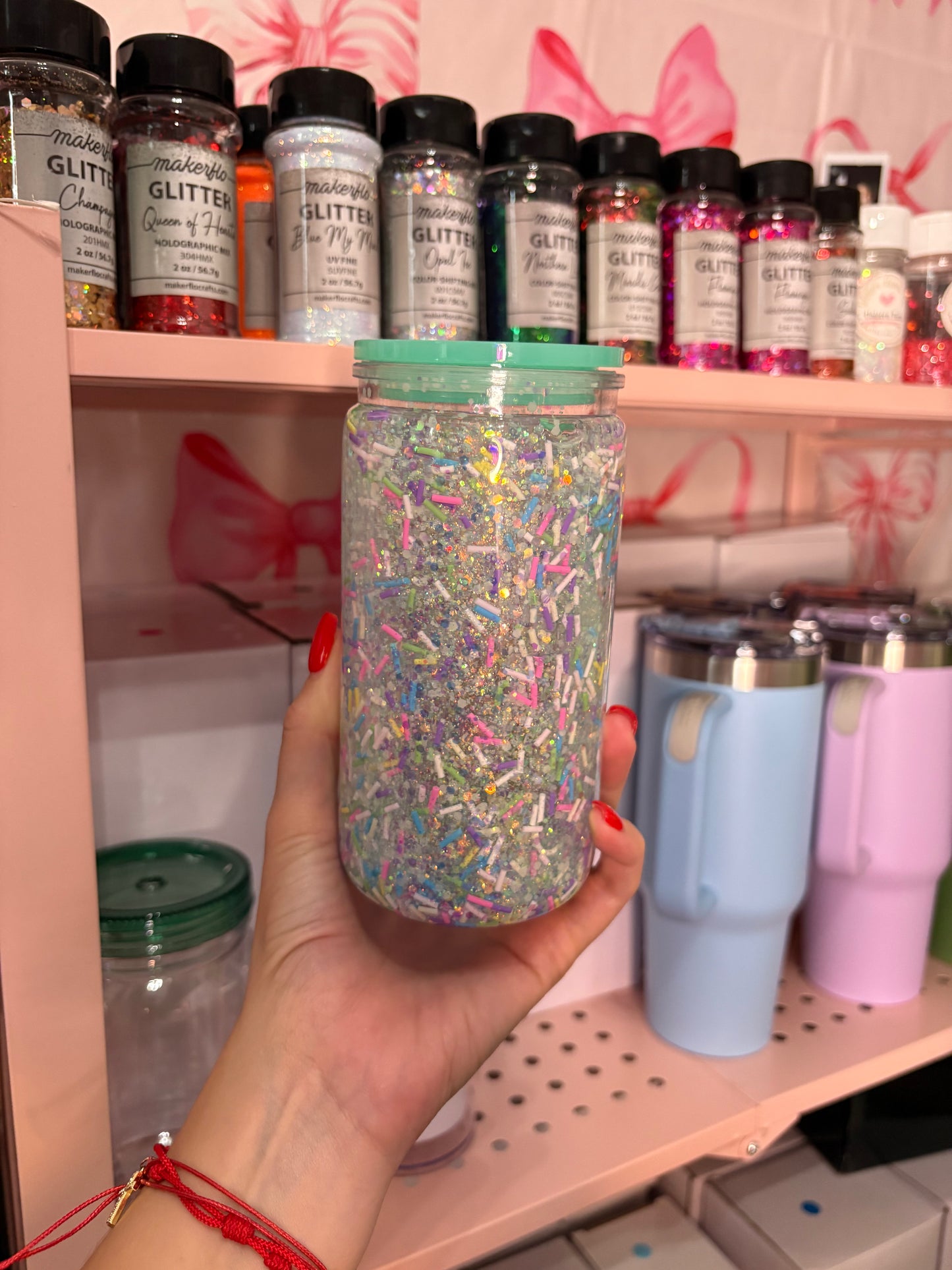 Premade 16oz cup in glow in the dark sprinkle snow globe